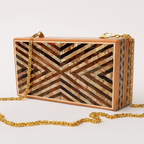 modern chevron pattern crafted with earthy tones of brown, beige, and gold - شيفرون حديث مصنوع من درجات اللون البني والبيج والذهبي الترابية
